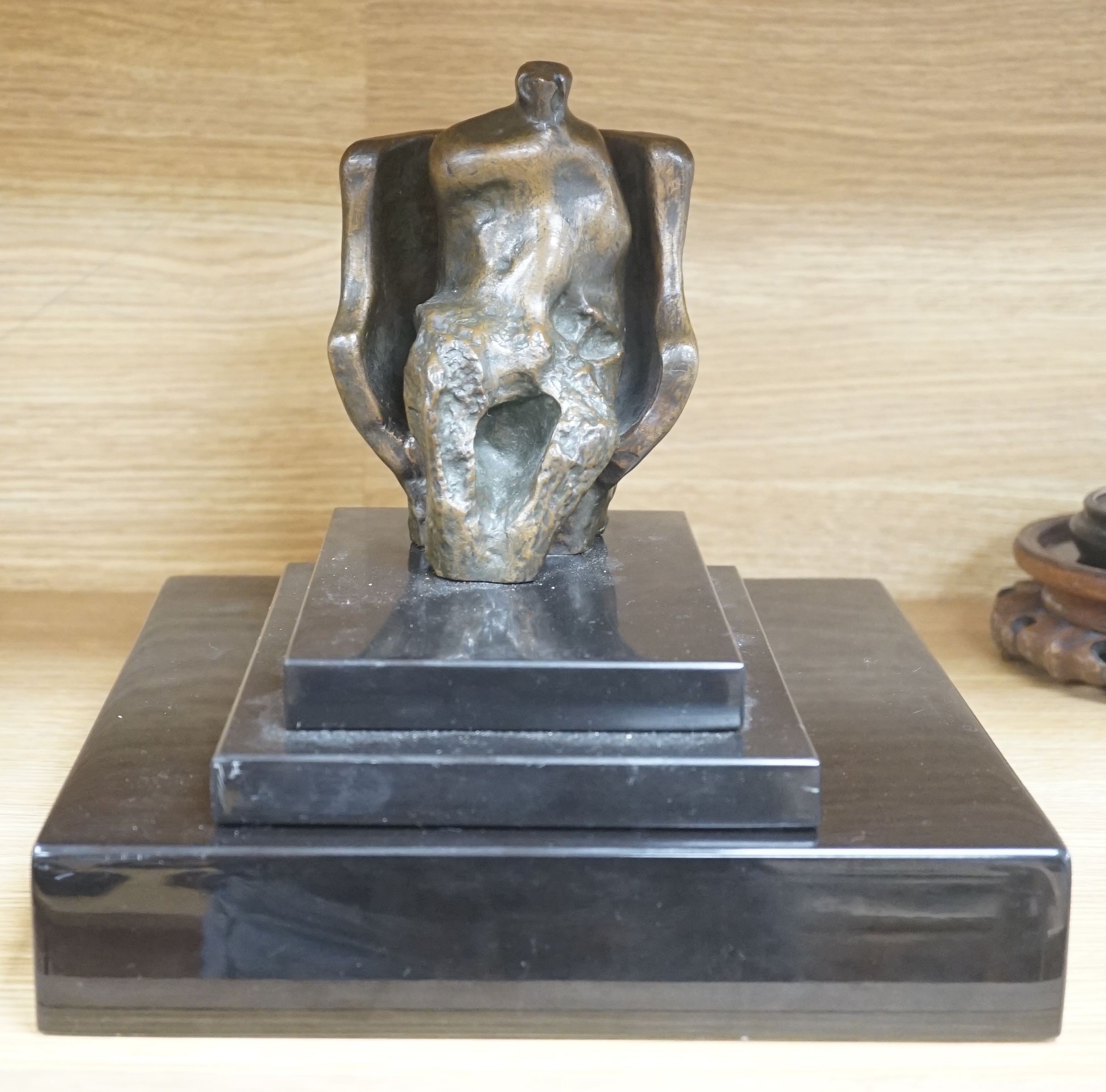 Attributed to James Butler b.1931, an abstract bronze seated figure on three tier plinth - 26.5cm tall